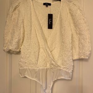 White ruffle bodysuit